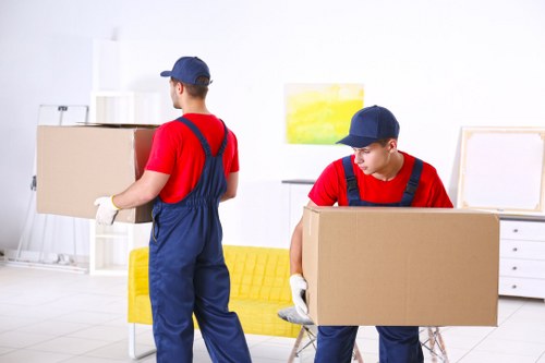 Same day removals team loading furniture for a Hampton home move