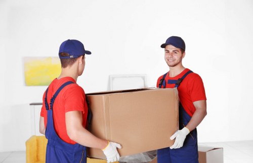 Careful loading of household furniture for transport in Hampton
