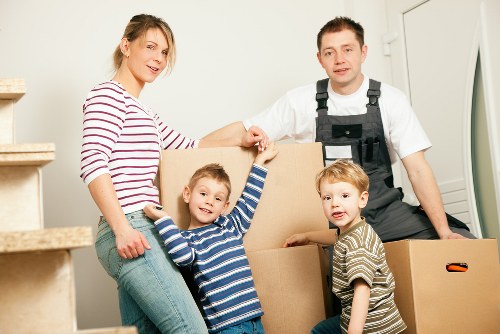 Office removals team handling business furniture in Hampton