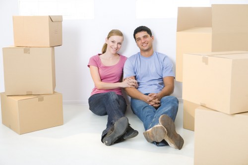 Loading furniture into a van for a move in Hampton