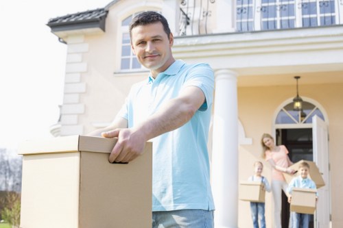 Residential flat move with careful carrying through a Hampton property