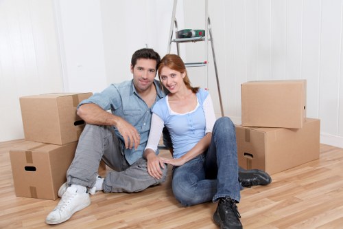 Moving van outside a Hampton flat with access planning for a local move