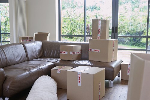 Packed boxes and furniture prepared for a local Hampton house move